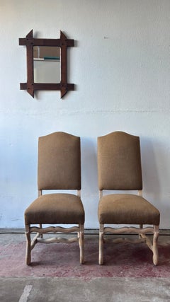 A Pair of os de mouton side chairs, French 1950s
