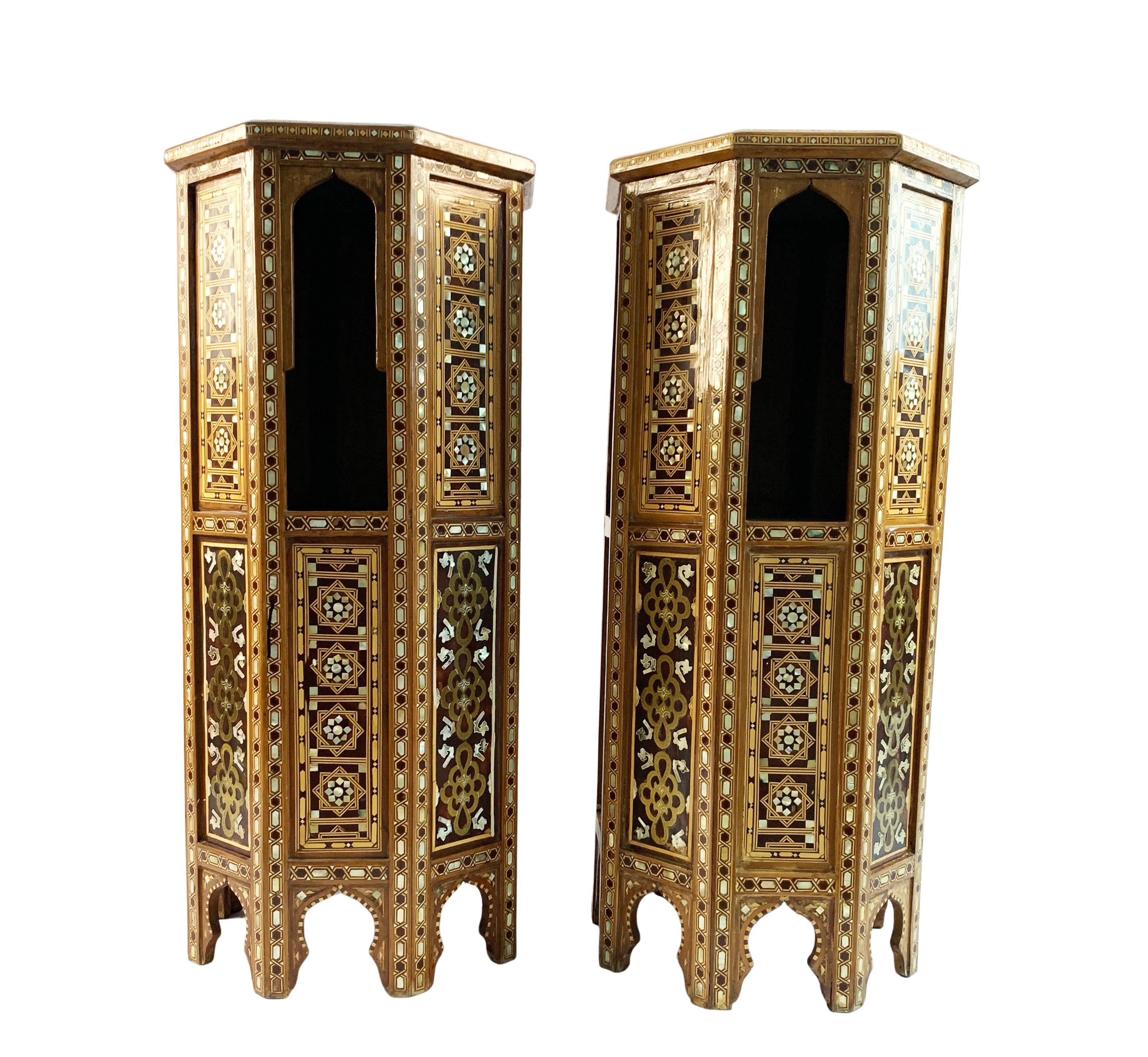 This unusual Stands with eight legs and cusped arches, inlaid with mother of pearl, tortoiseshell and bone forming a fine geometrical design, storage area inside the top arches, The skill and time that went into creating these stands is remarkable.