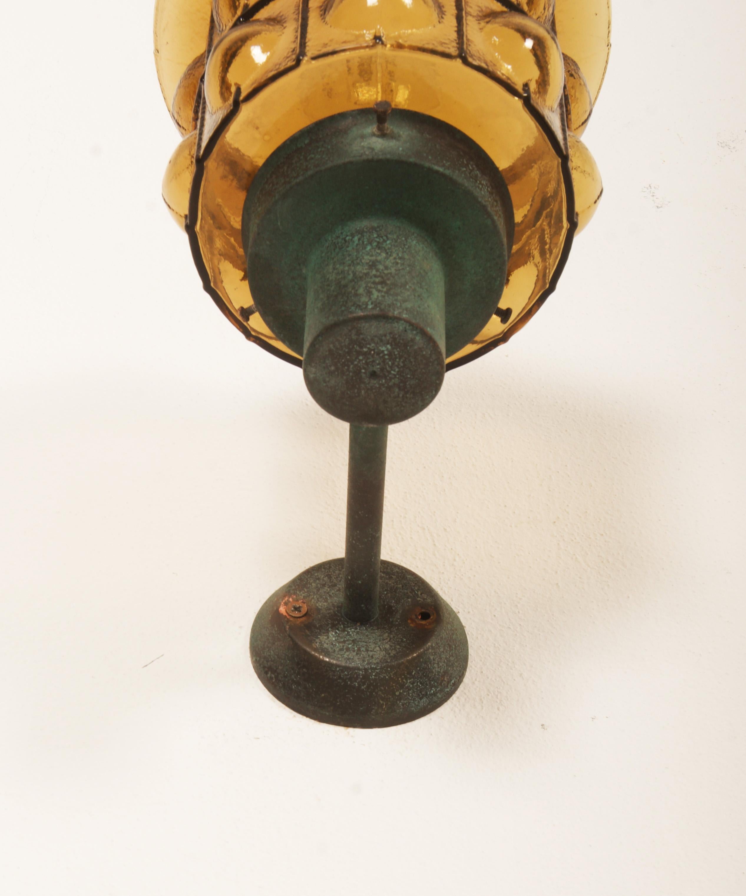 A Pair Of Outdoor Metal Wall Lamps With Glass Shades 4