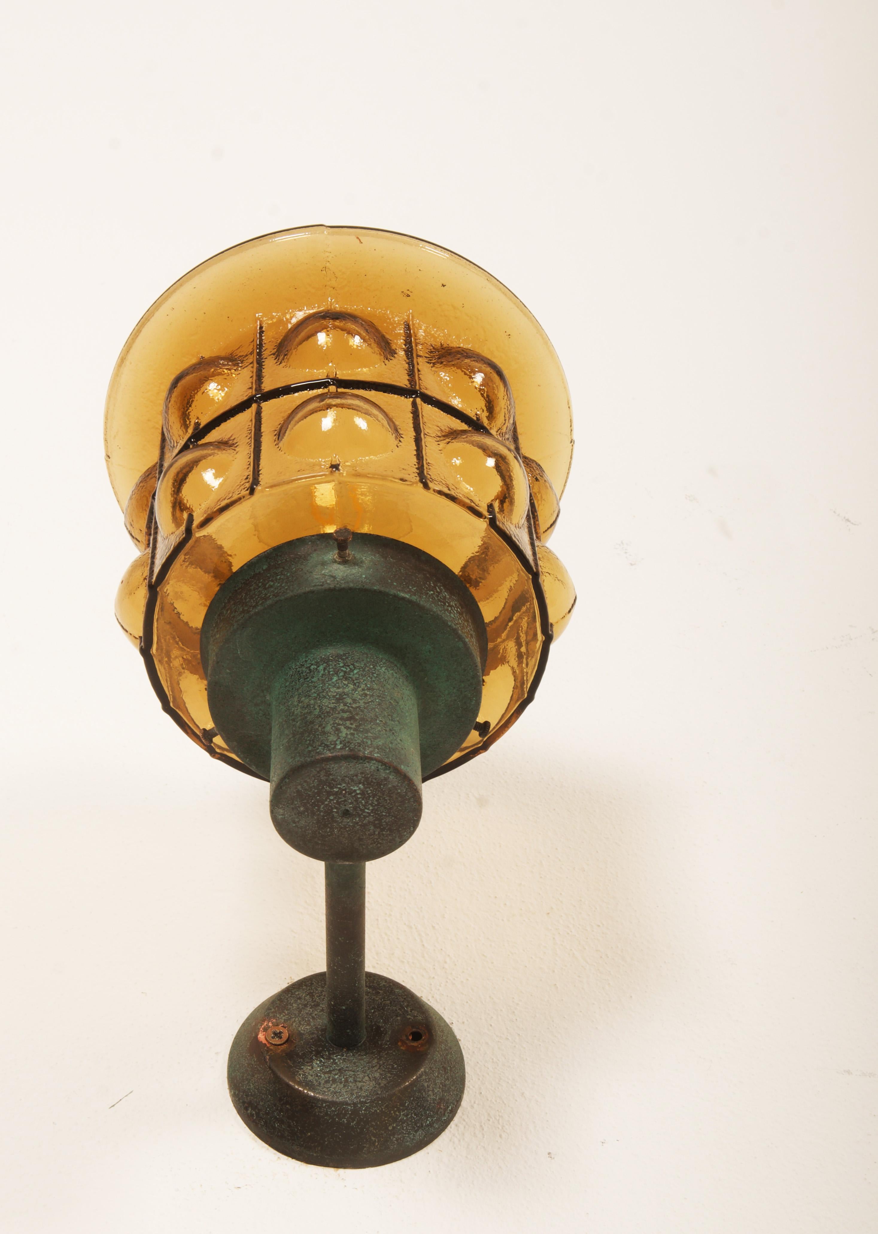 A Pair Of Outdoor Metal Wall Lamps With Glass Shades 5