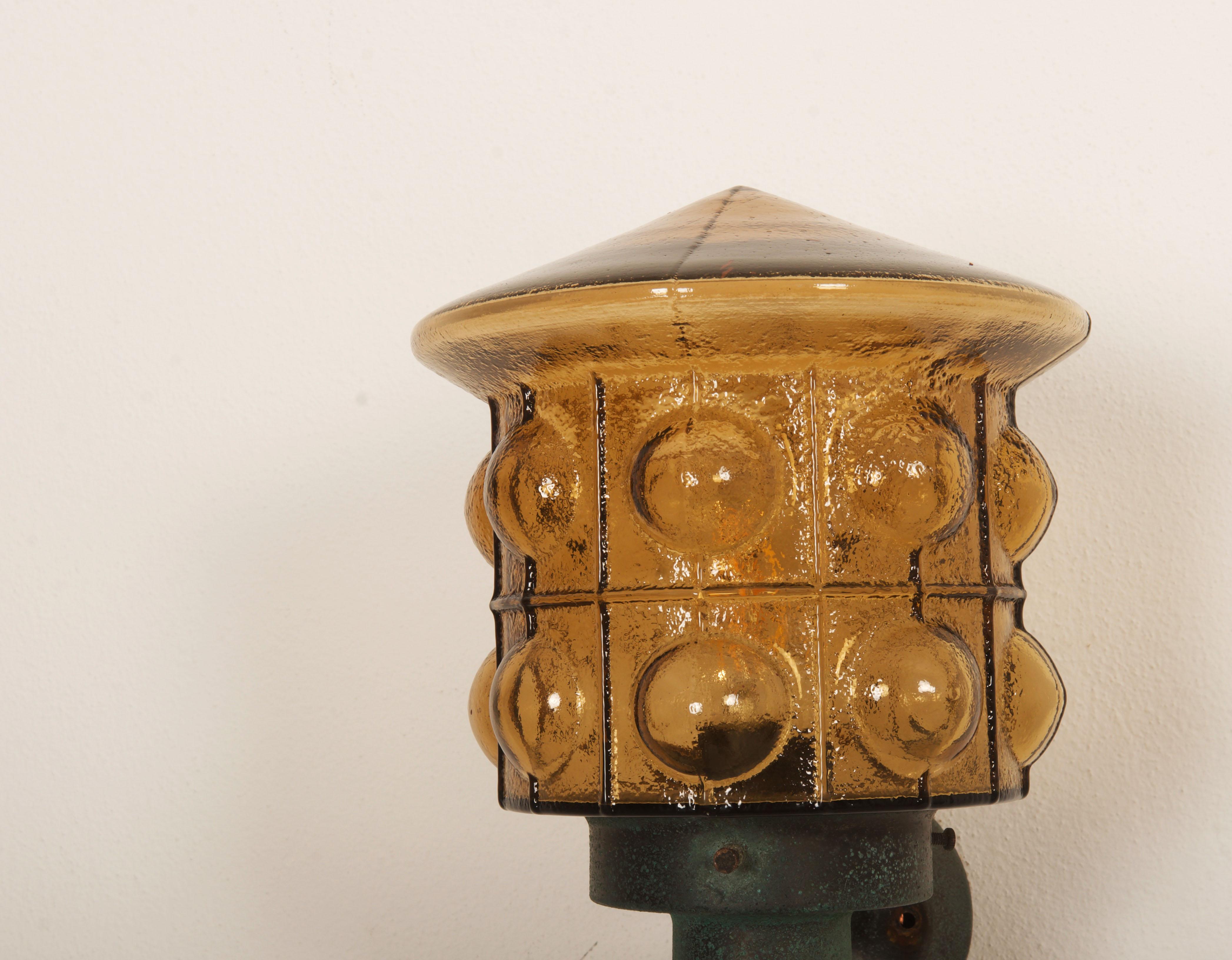 A Pair Of Outdoor Metal Wall Lamps With Glass Shades 1