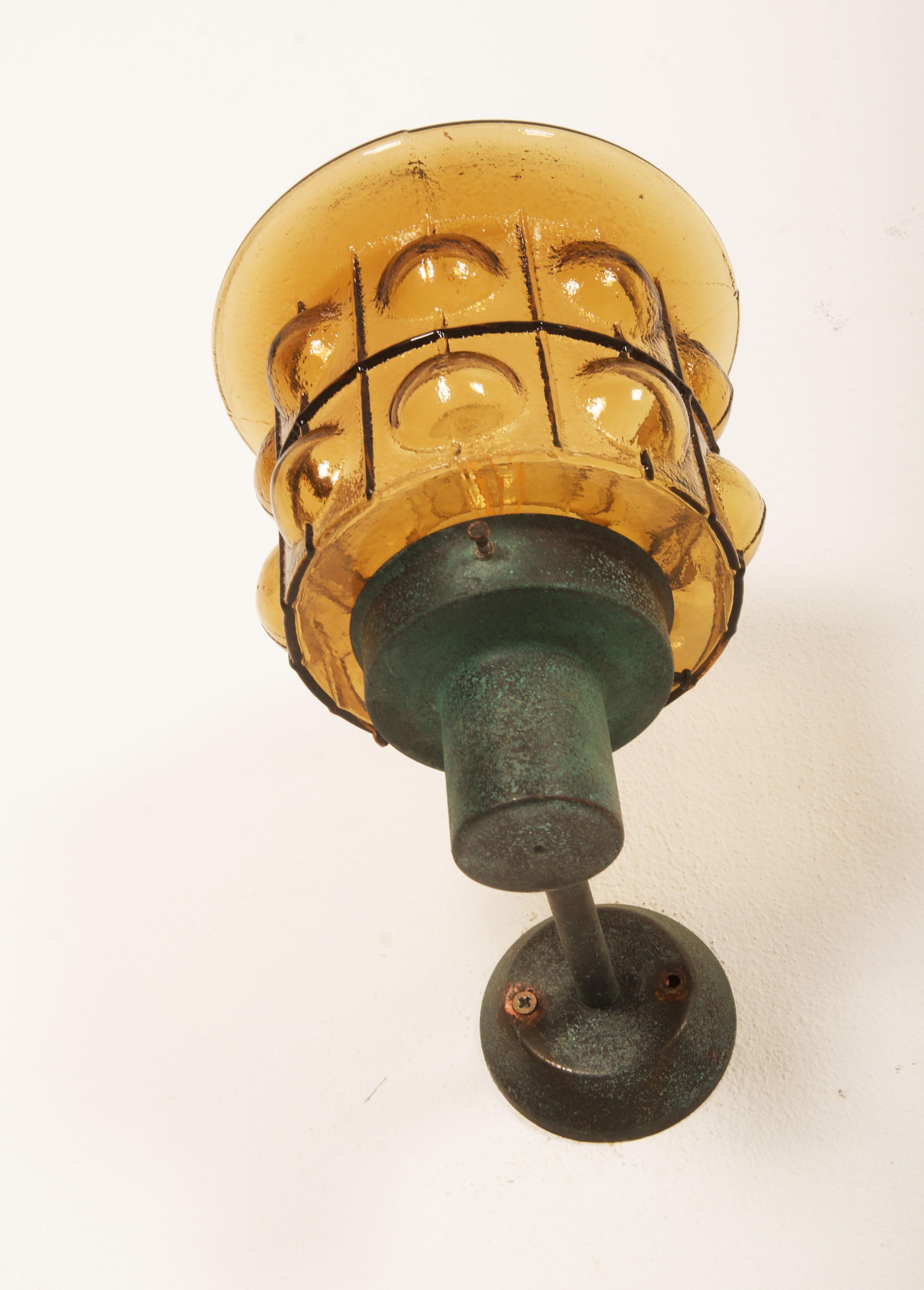 A Pair Of Outdoor Metal Wall Lamps With Glass Shades 3