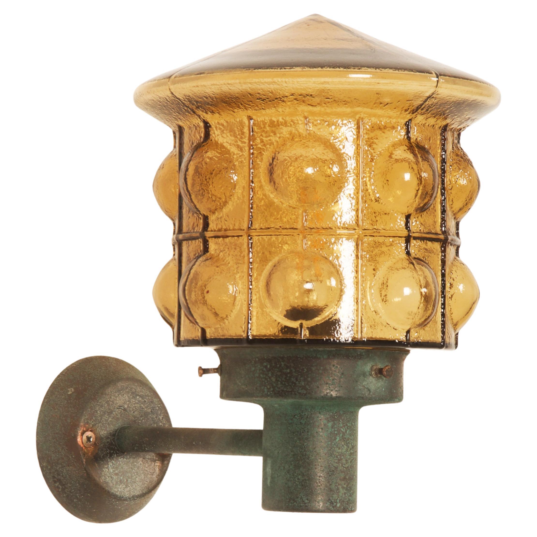 A Pair Of Outdoor Metal Wall Lamps With Glass Shades