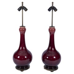 Paire de lampes de table en céramique émaillée de couleur sang-de-bœuf