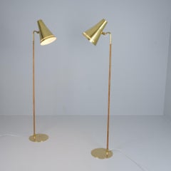 A Pair of Paavo Tynell Floor Lamps Model 9628 in Brass and Rattan, Taito 1950s