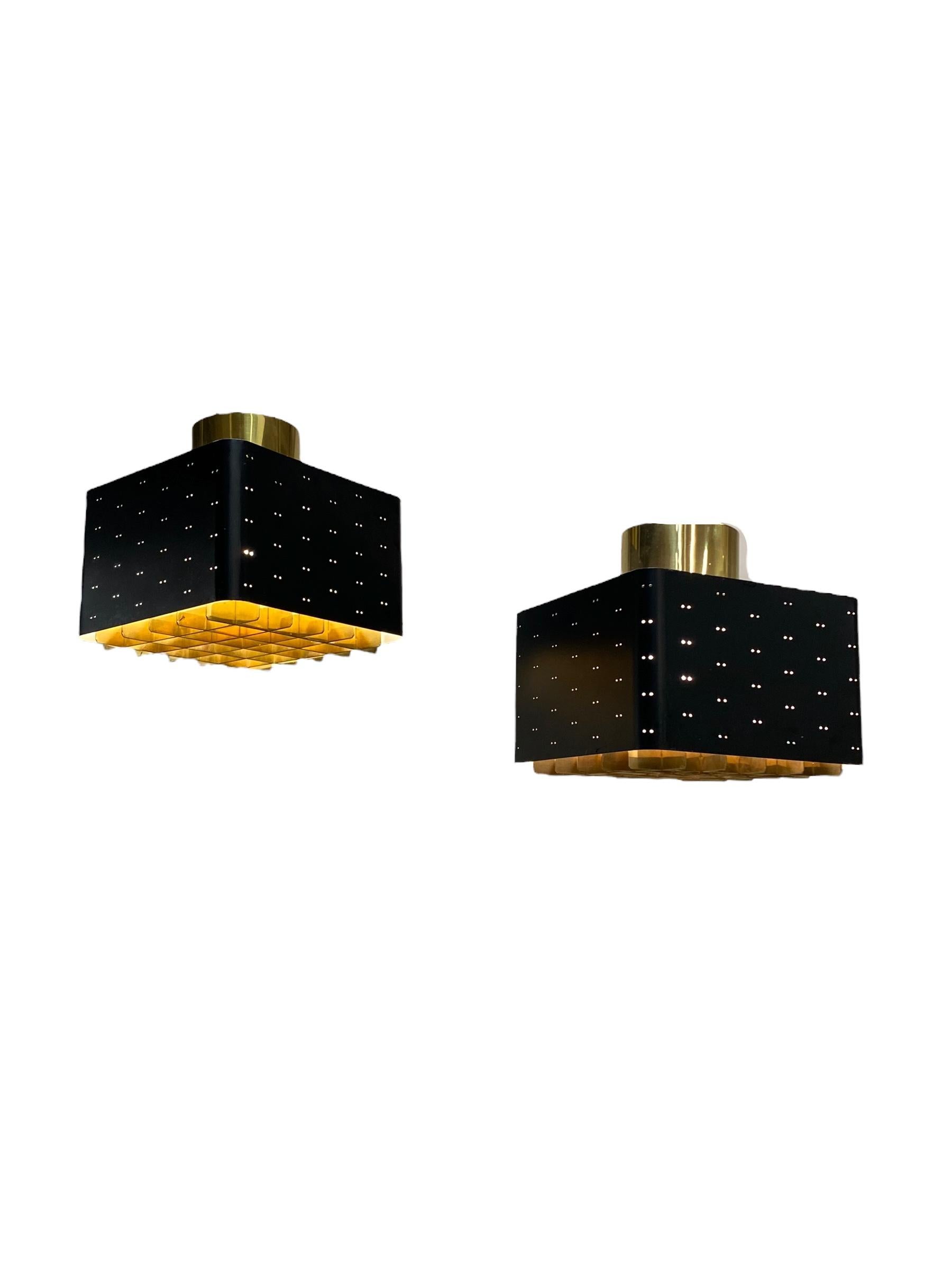 The Starry Sky is one of the most iconic designs of Paavo Tynell's lamps. It was made by both Taito and Idman in many different sizes. The way the light filters through the grill and the holes on the sides makes the ceiling look like a starry sky.
