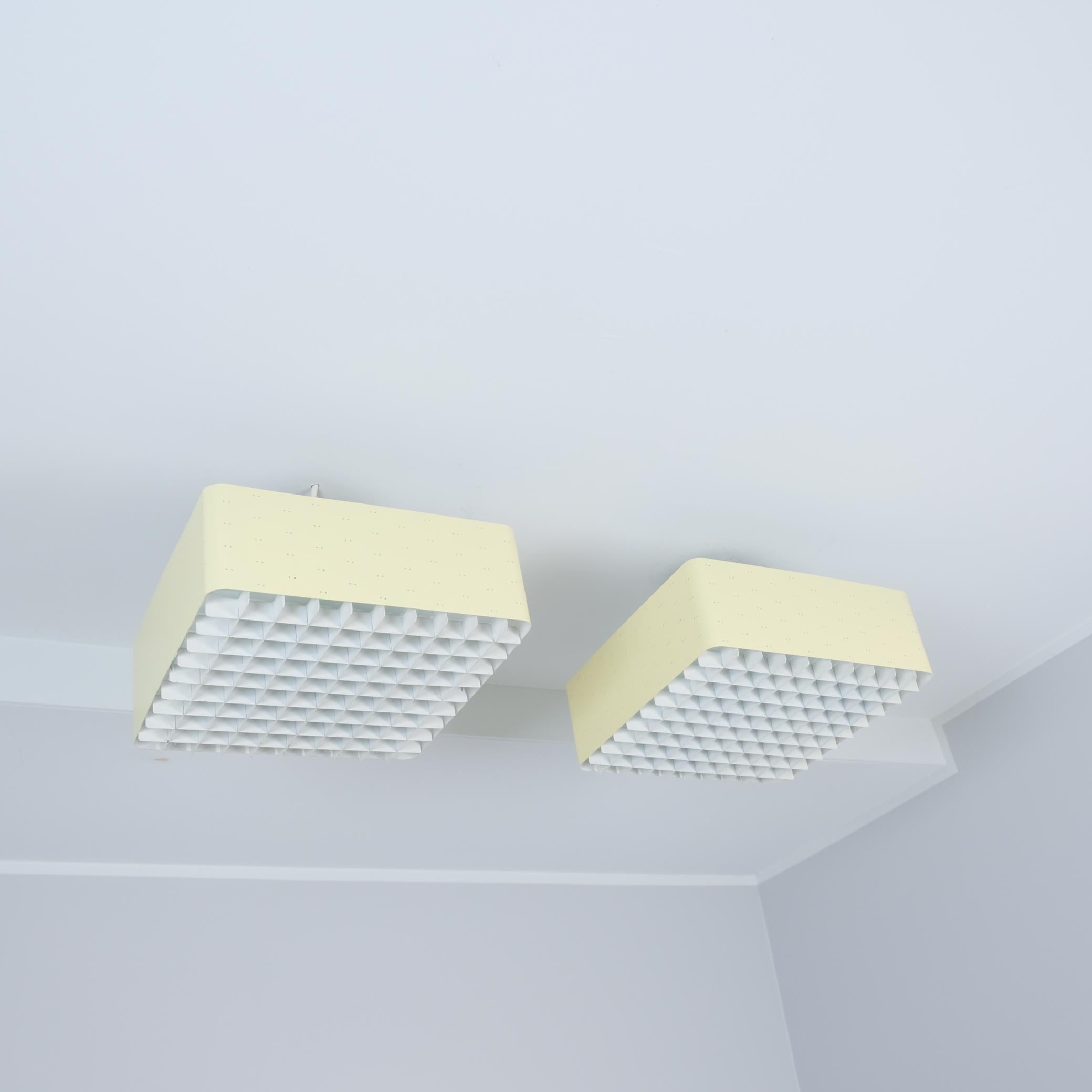 The Starry Sky is one of the most iconic designs of Paavo Tynell's lamps. It was made by both Taito and Idman in many different sizes. The way the light filters through the grill and the holes on the sides makes the ceiling look like a starry sky.