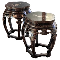 A pair of painted and carved lacquered stools, Hong Kong 20th century