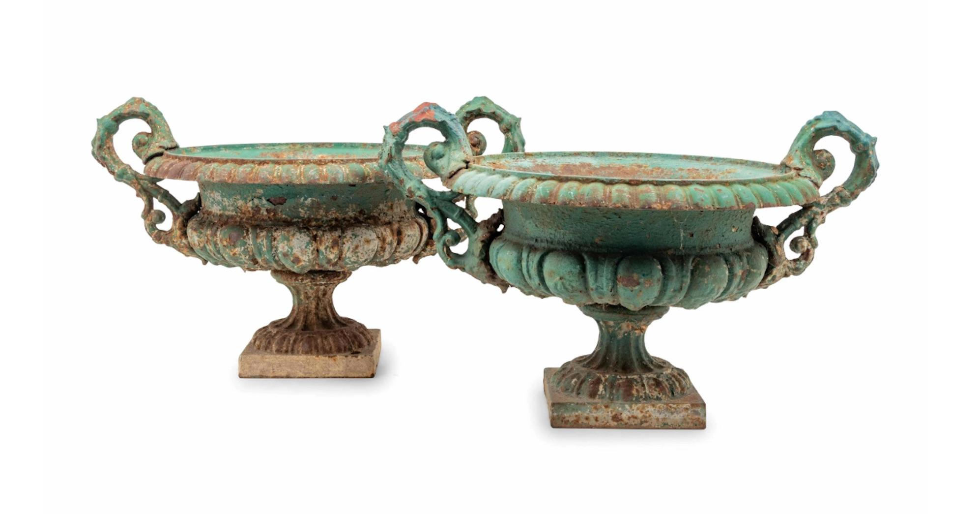 A pair of painted cast iron jardinieres, lovely old worn painted finish/patina.
Measures: Height 13 1/8 inches.
  