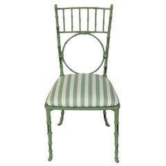 A Pair of Painted Faux Bamboo Chairs