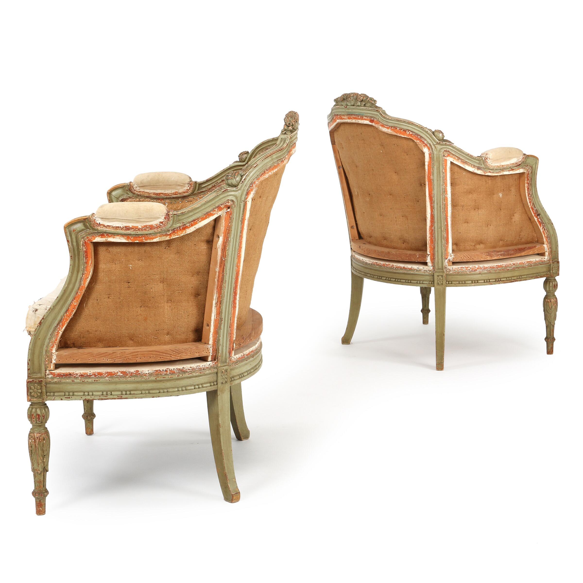 An beautiful pair of Swedish painted armchairs, in the Gustavian style, circa 1900.
Painted grey or green and antique white with gold trim, carved with rosette
decoration. Can be used as is for 'shabby chic' look or are ready for recovering.
  