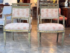 A Pair of Painted Italian Arm Chairs