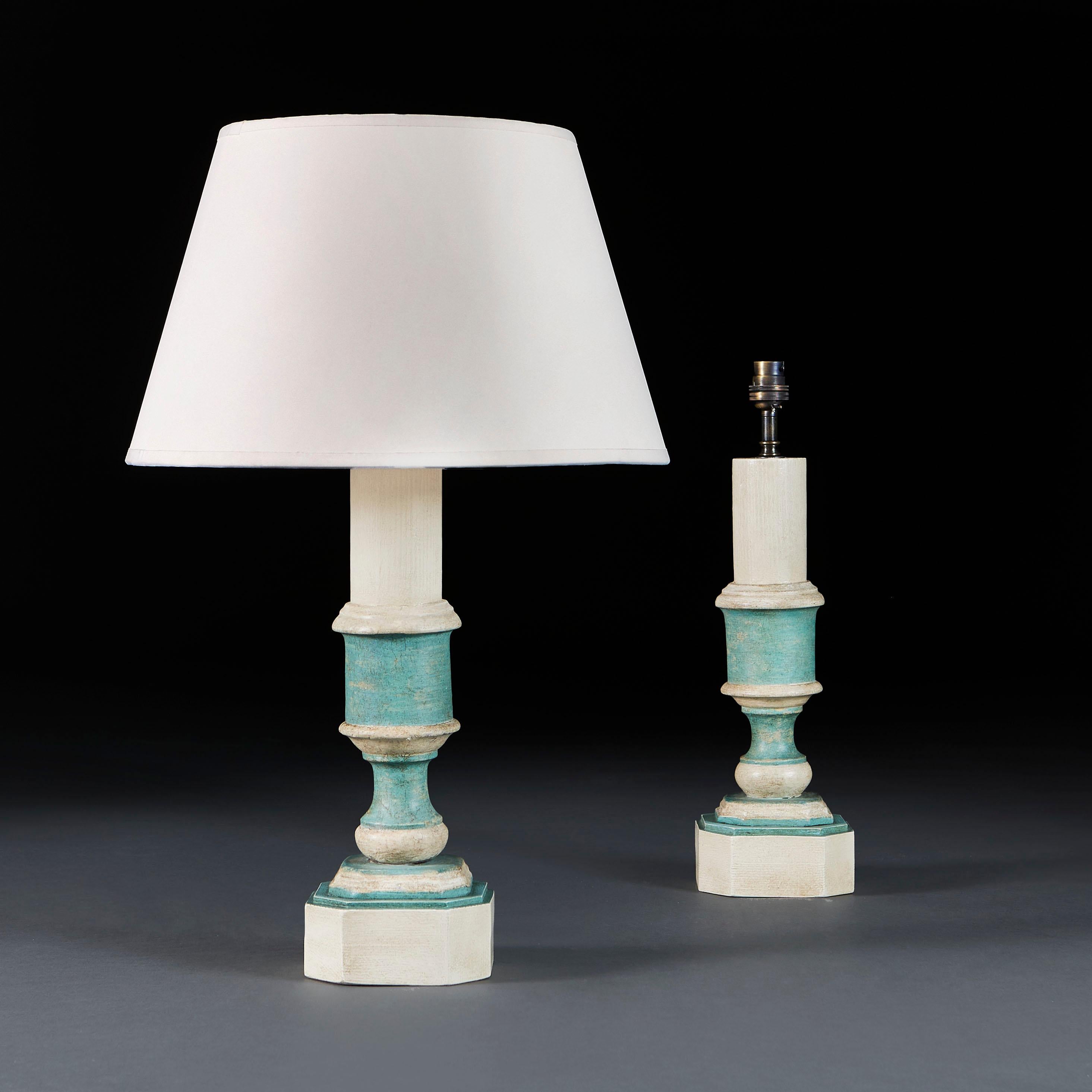 Italy, circa 1890

A pair of late nineteenth century candlesticks painted in ivory and aquamarine blue, now mounted as lamps.

Height 34.50cm
Height with shade 56.50cm
Width 12.50cm
Depth 12.50cm

Please note: This is currently wired for the UK with