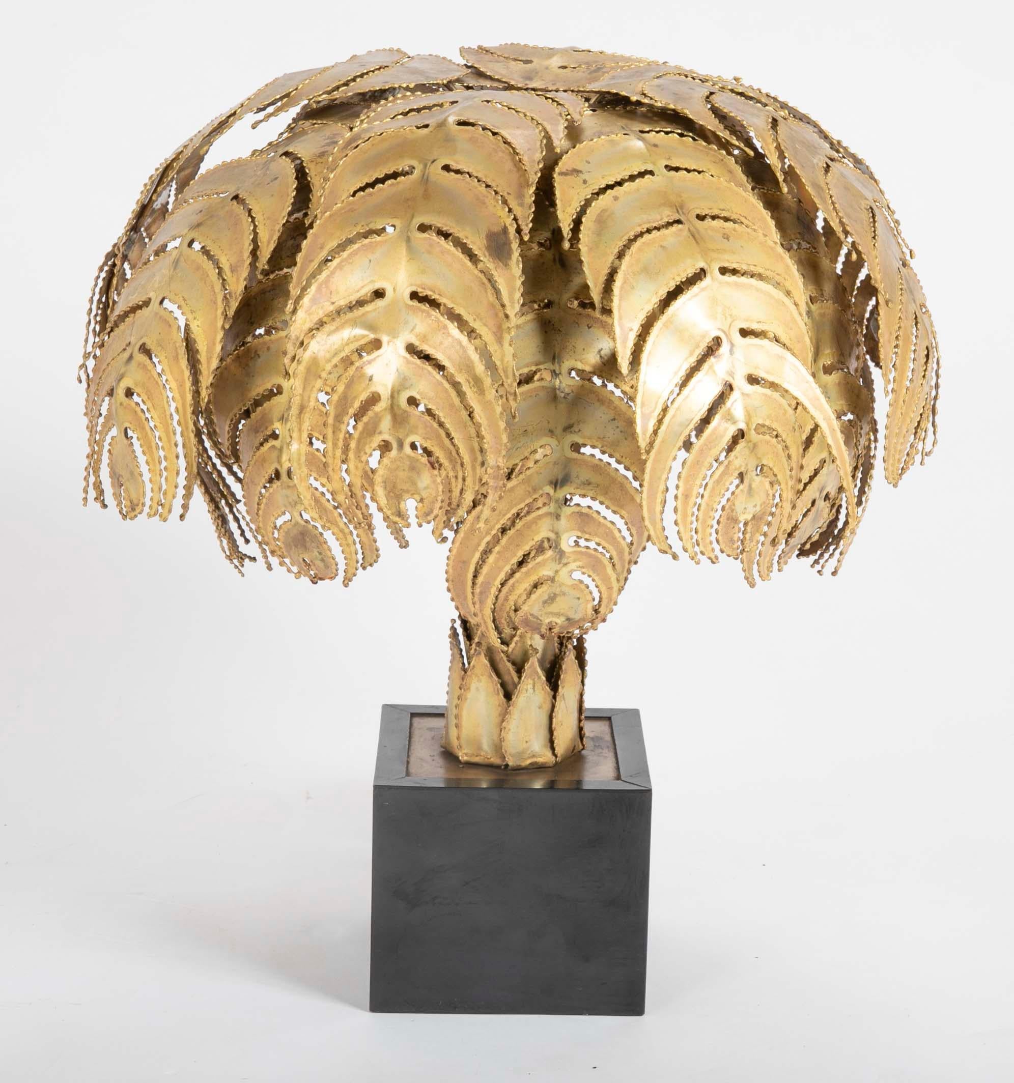 A pair of French brass table lamps by Christian Techoueyes for Maison Jansen. Palm tree forms in laminated and brass 