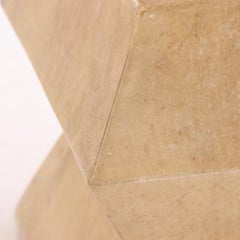 Coppia di sgabelli rivestiti in pergamena di forma architettonica.