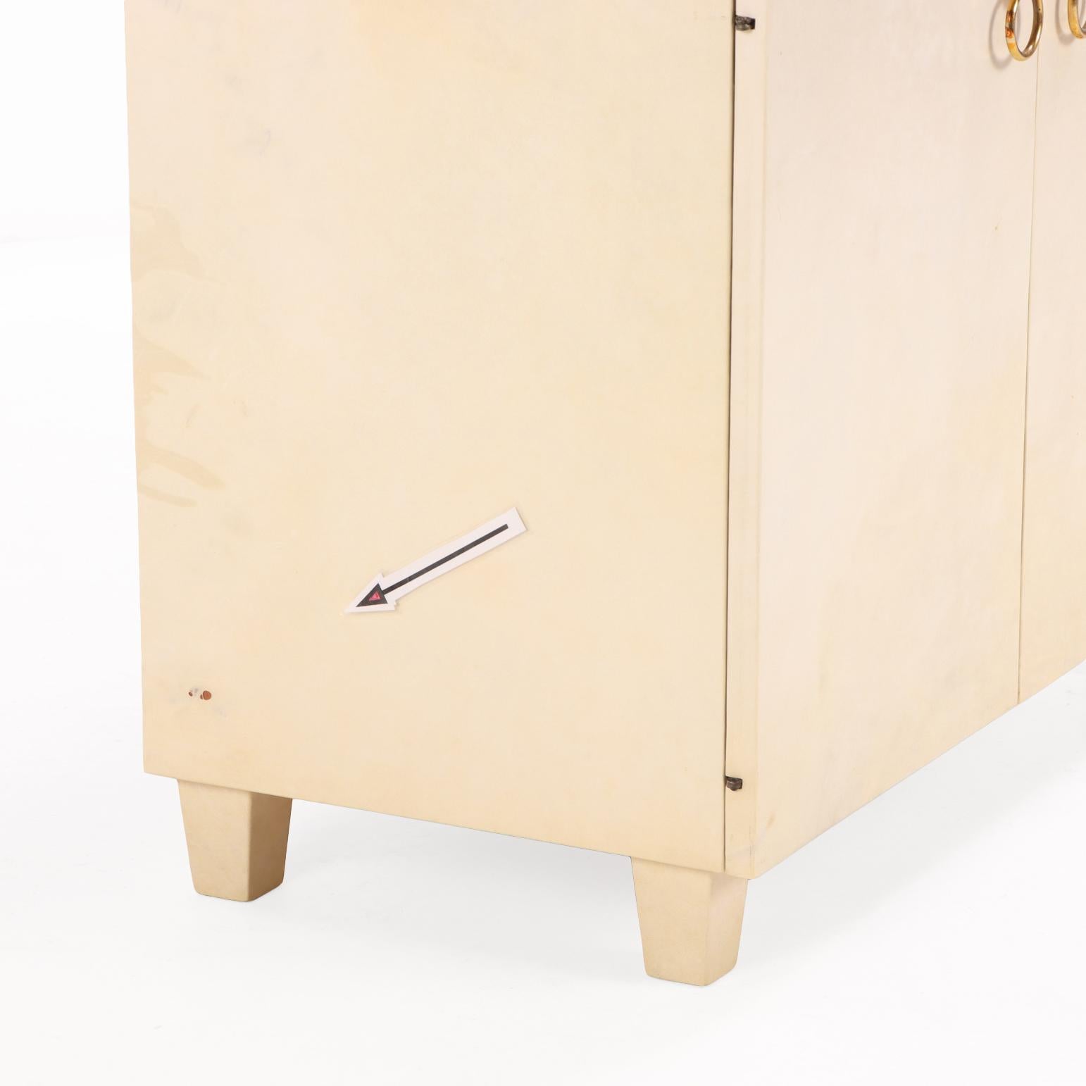 Mid-Century Modern A Pair of Parchment Covered Two-Door Cabinets, C. 1950. For Sale