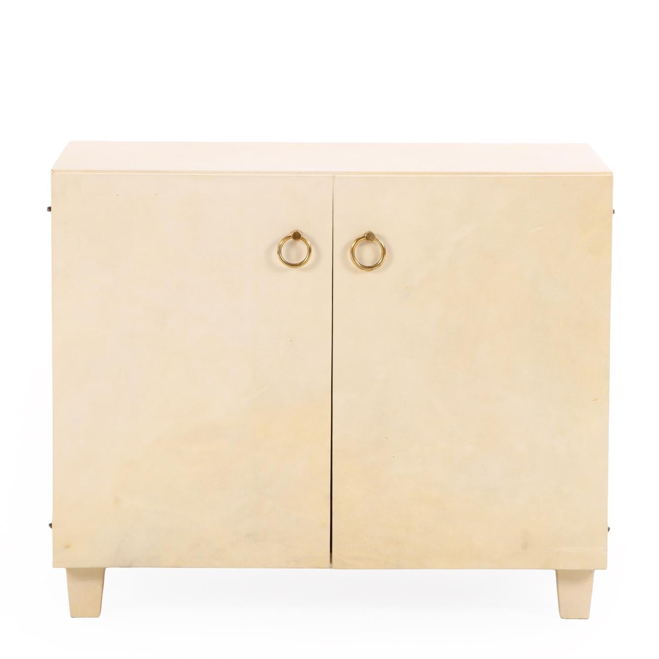 A Pair of Parchment Covered Two-Door Cabinets, C. 1950. In Good Condition For Sale In Philadelphia, PA