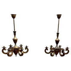 A Pair of Parisian Art Deco Brass Chandeliers