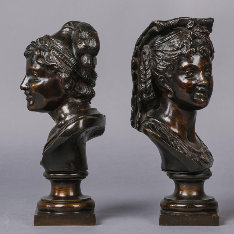 A pair of patinated bronze busts.

French, circa 1870.