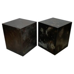 A Pair of Patinated Steel Cubes