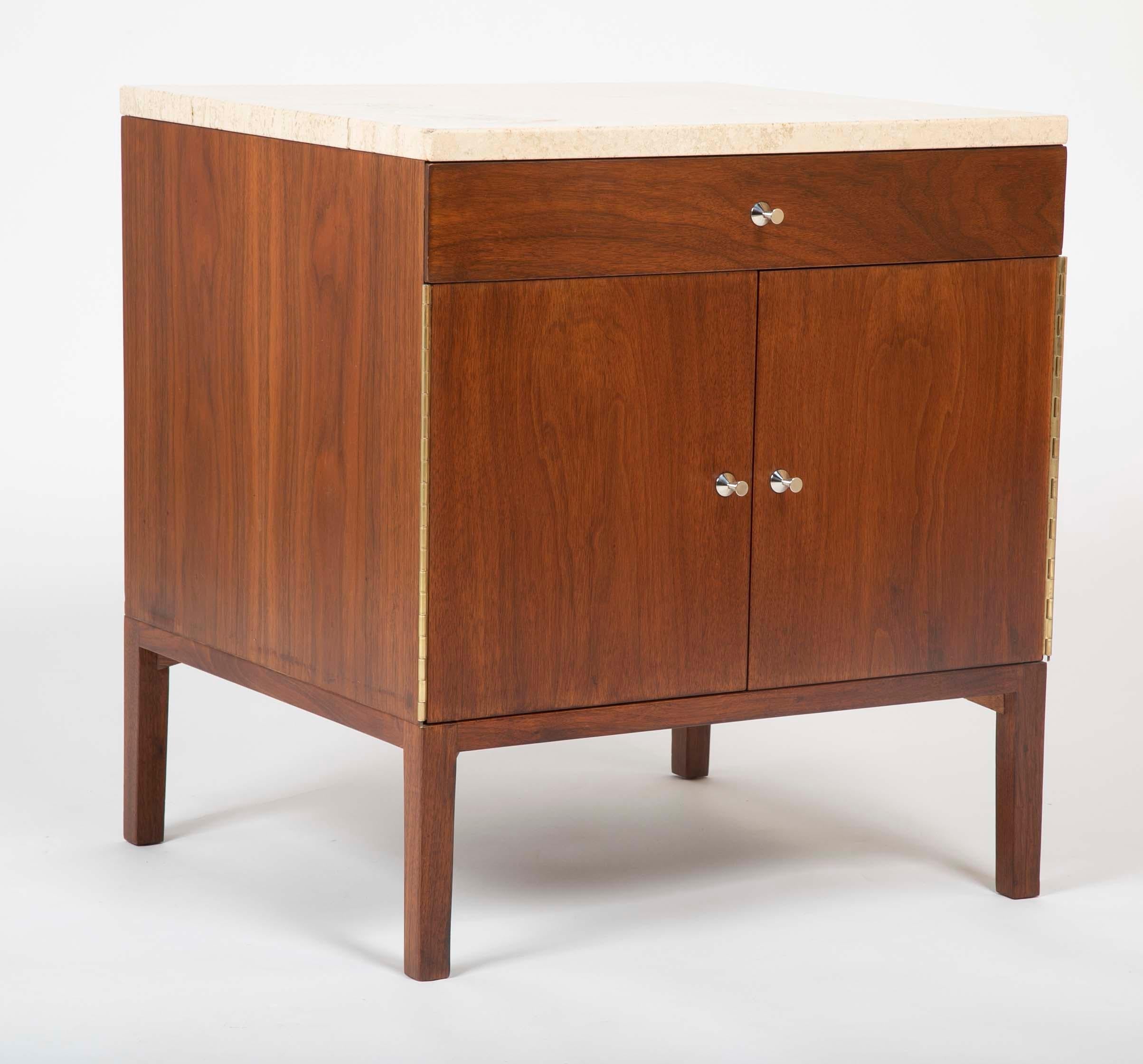 A gorgeous pair of Mid-Century Modern walnut and travertine nightstands or side tables from the 