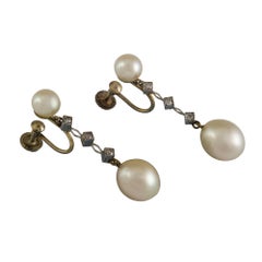 A Pair Of Pearl And Diamond Drop Earrings