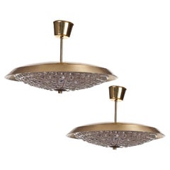A pair of pendants by Carl Fagerlund for Orrefors