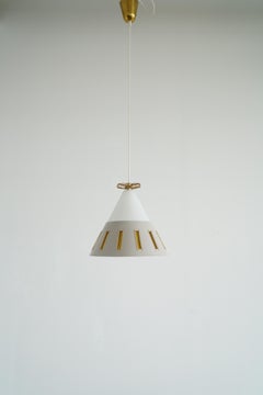 A pair of pendants by Paavo Tynell