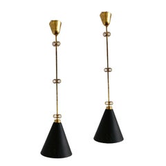A pair of pendants by Paavo Tynell