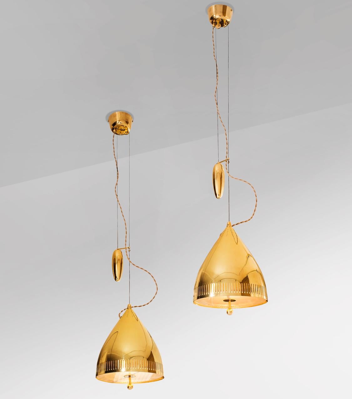Scandinavian Modern Pair of Pendants by Paavo Tynell For Sale