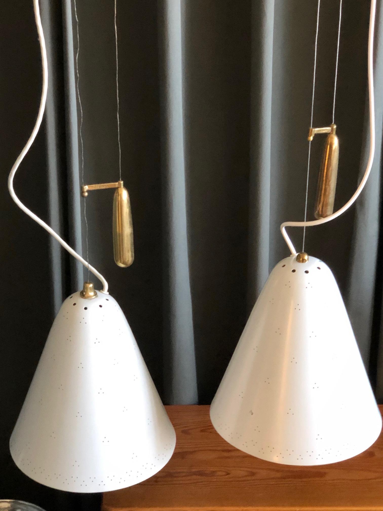 Metal Pair of Pendants by Paavo Tynell For Sale