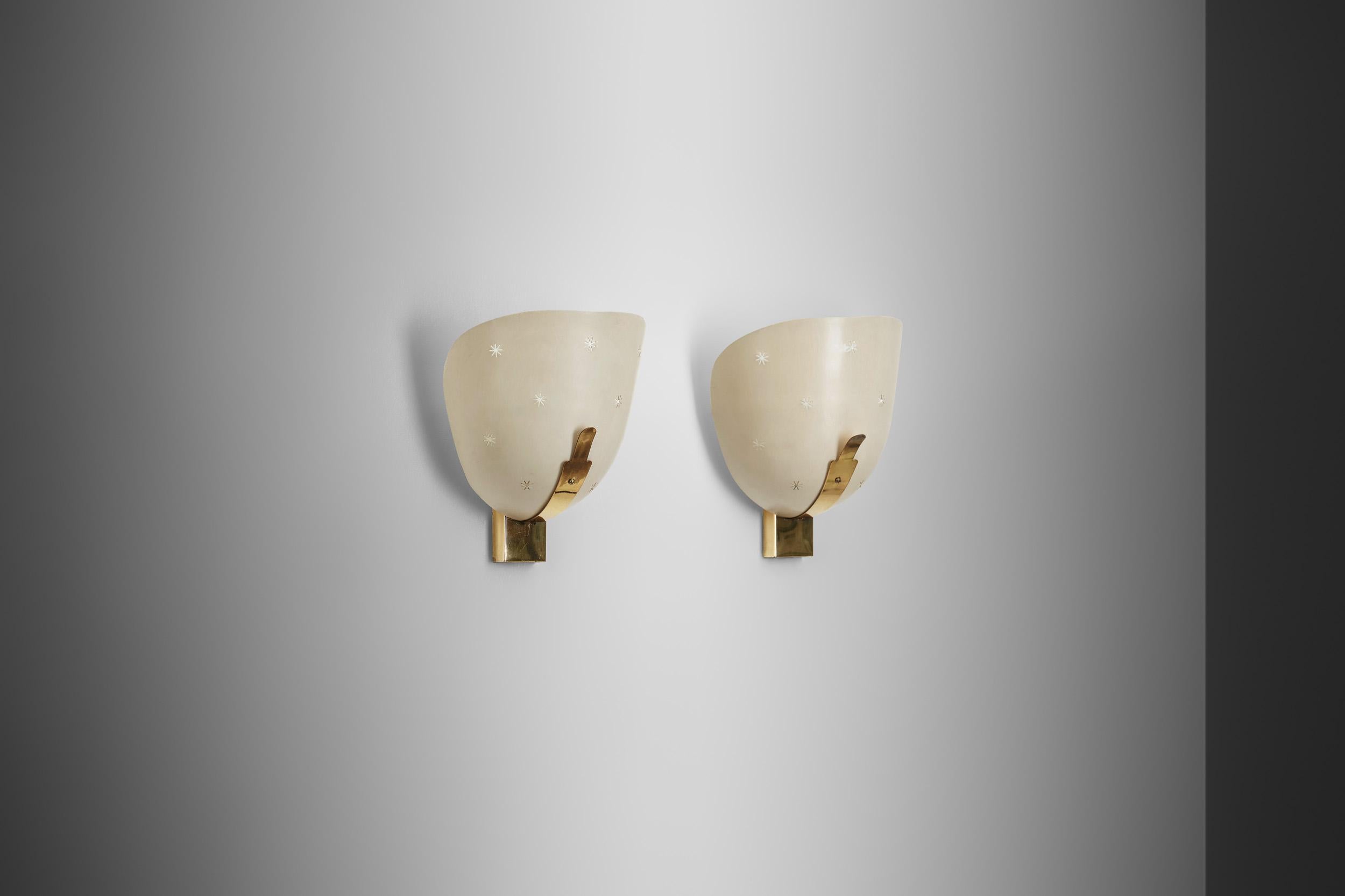 Mid-Century Modern A Pair of Perforated Brass and Metal Wall Sconces, Europe 1950s