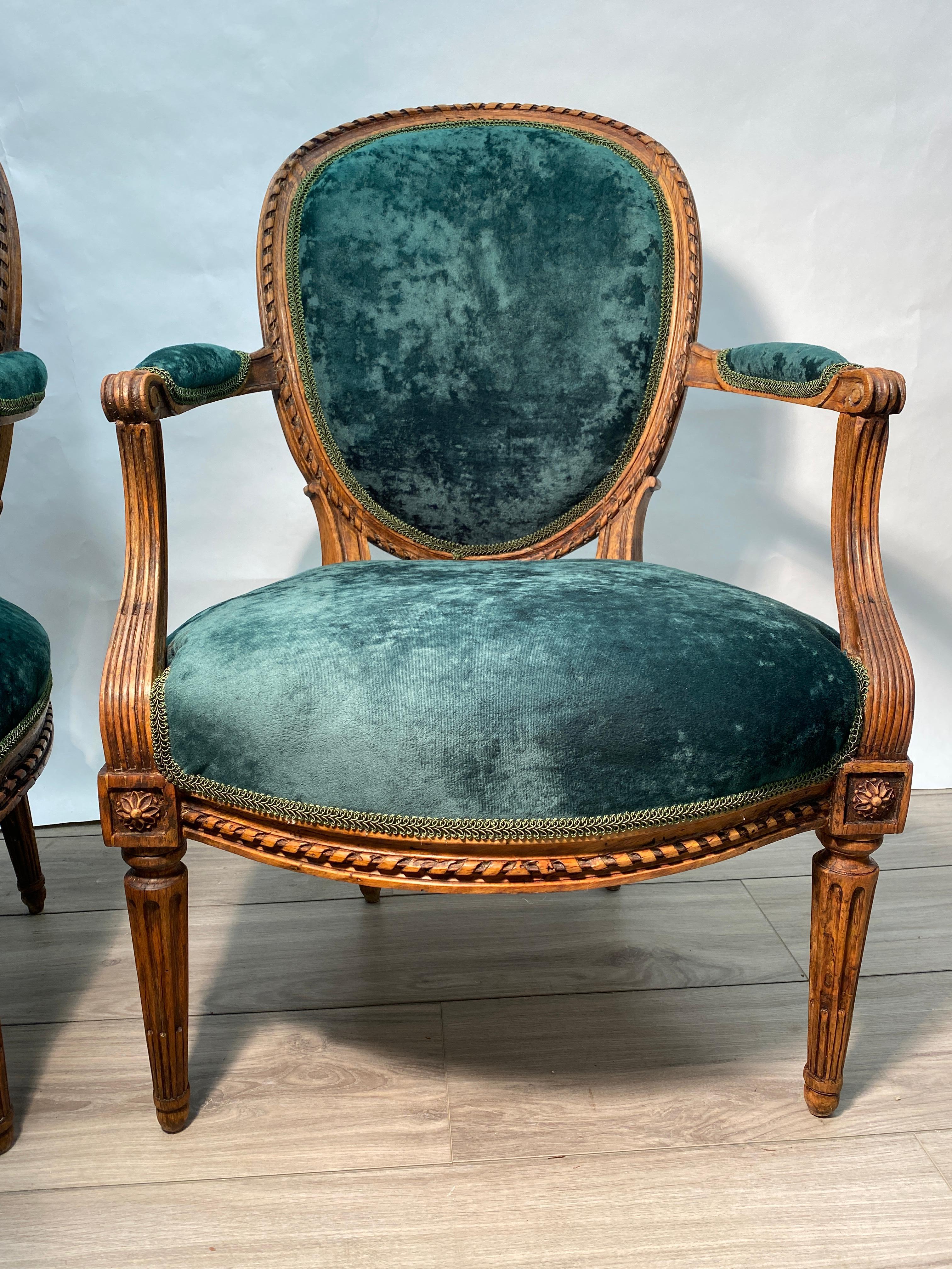 Pair of Period 18th Century French Louis XVI Walnut Fauteuil Arm Chairs In Good Condition For Sale In Nashville, TN