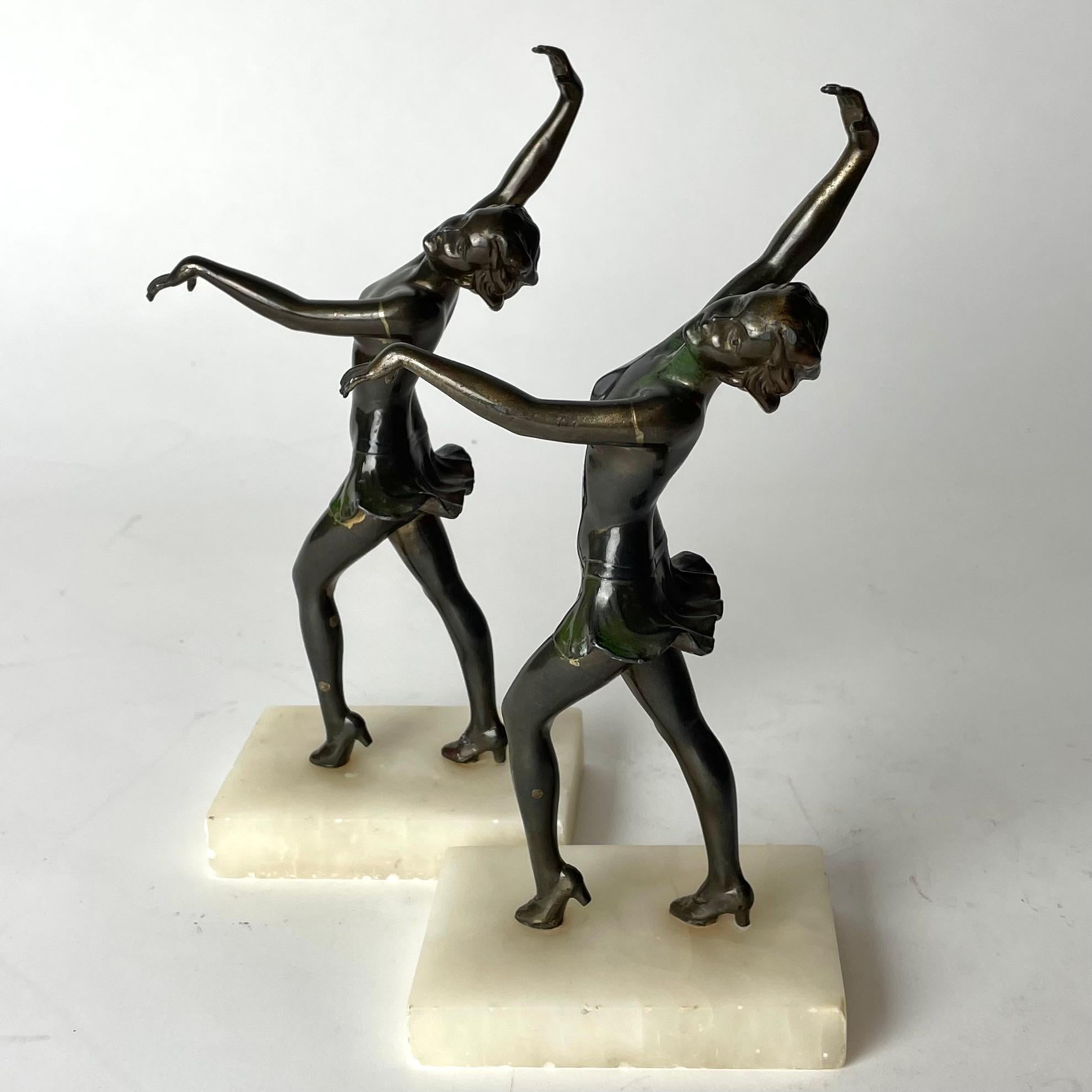 Metal A pair of period Art Deco Bookends from 1920s-1930s with dancing women.