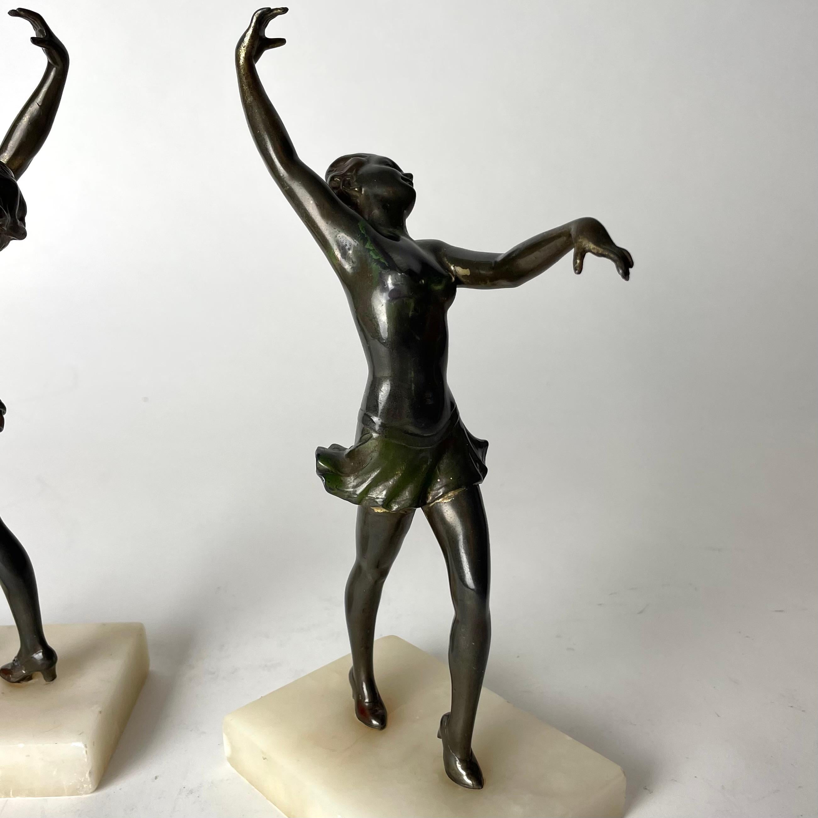 A pair of period Art Deco Bookends from 1920s-1930s with dancing women. 2