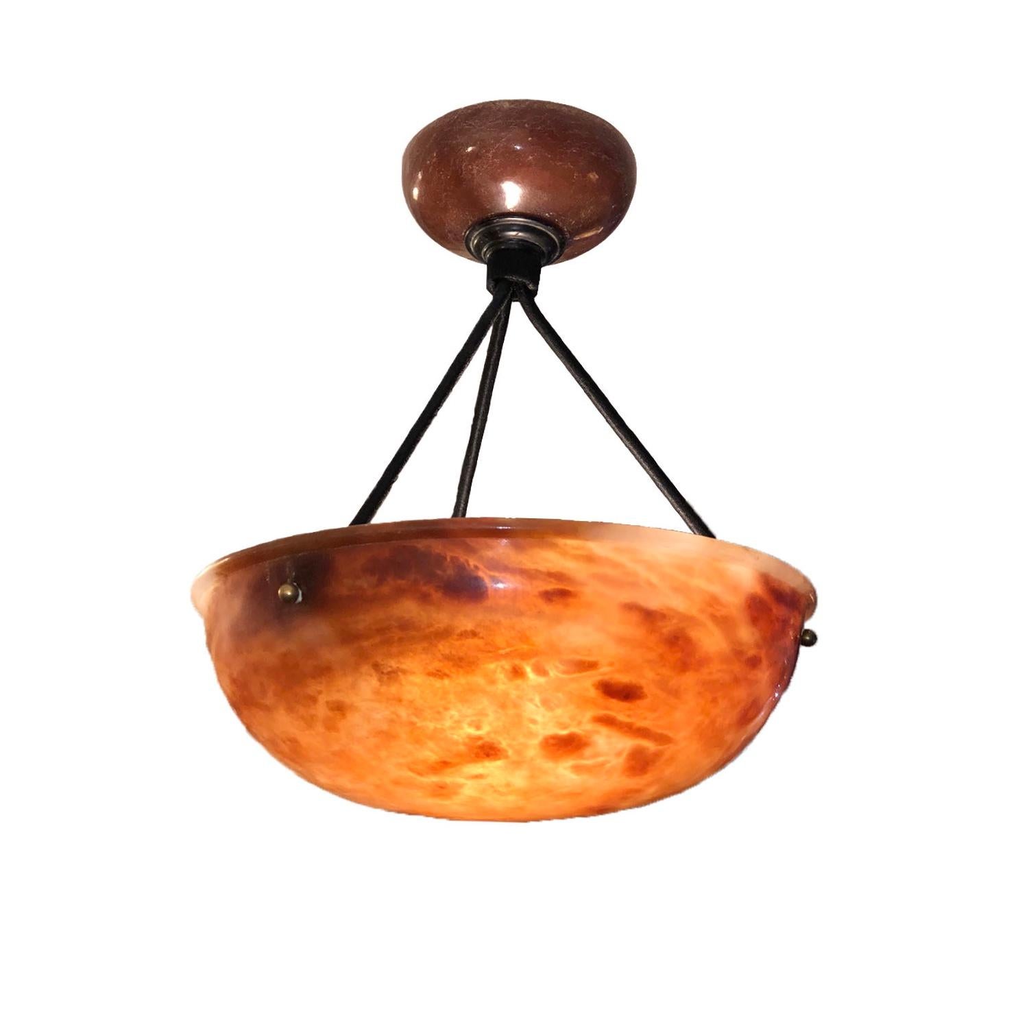 Carved from the same block of amber alabaster, this pair of 12 inch diameter lights mounts three bulbs each and can be altered to any drop required free of charge. Rope color may also be changed if desired.