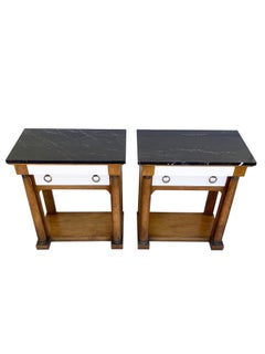 Neoclassical-style bedside or side tables with marble tops, by Baker Furniture