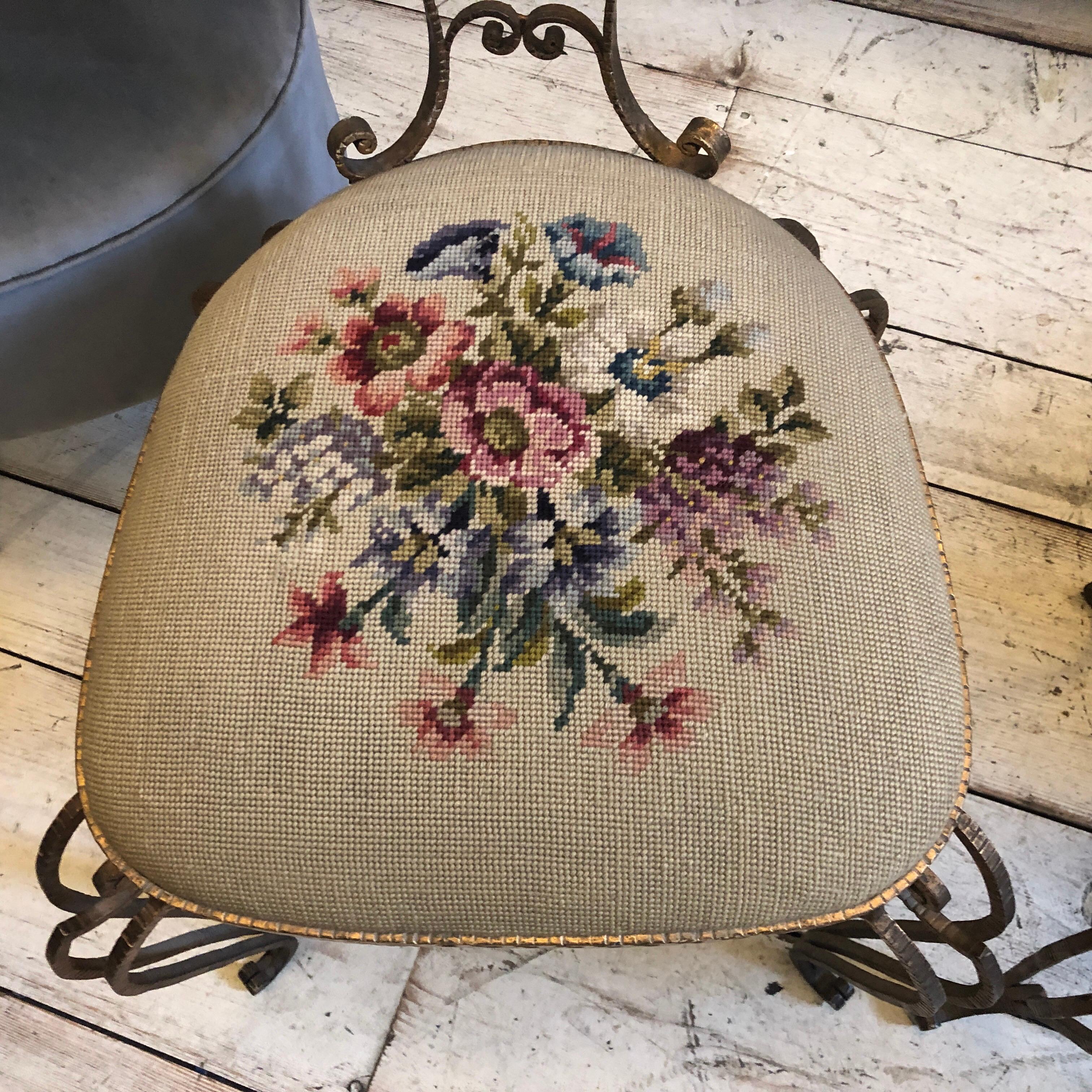 Two gorgeous gilded iron high backrest chairs designed by Pier Luigi Colli, very precious hand embroidered original fabric. They are made in Italy in the 1950s.