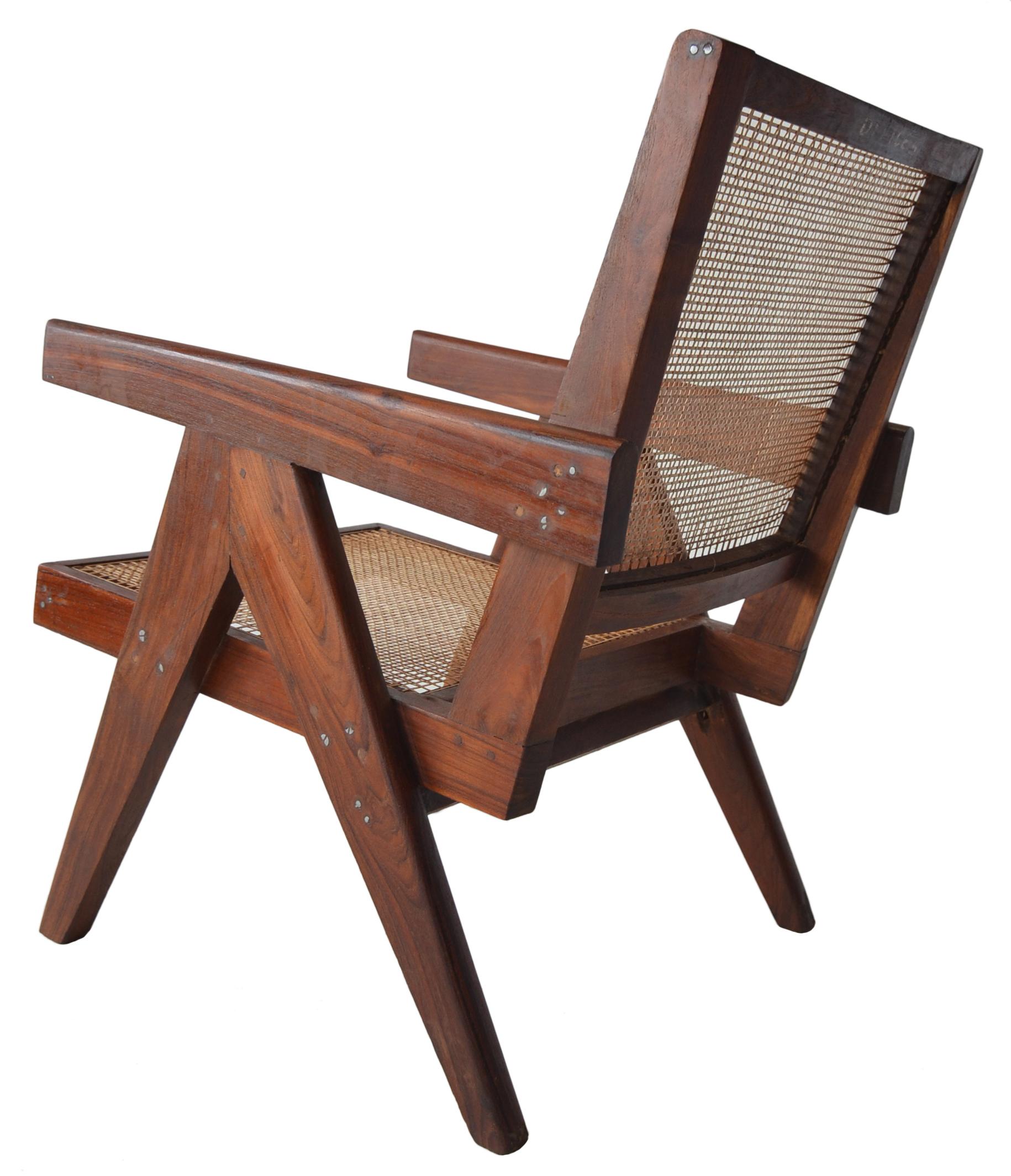 A great pair of easy chairs by Pierre Jeanneret for the Chandigarh project. In a very rare and desirable Sisso Rosewood. This pair is lightly and sympathetically renovated. A simple cleaning and waxing was performed to bring out the color and grain