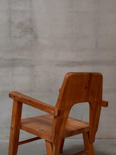 A pair of pine armchairs, openwork back tray, manufacturer Vemdalia