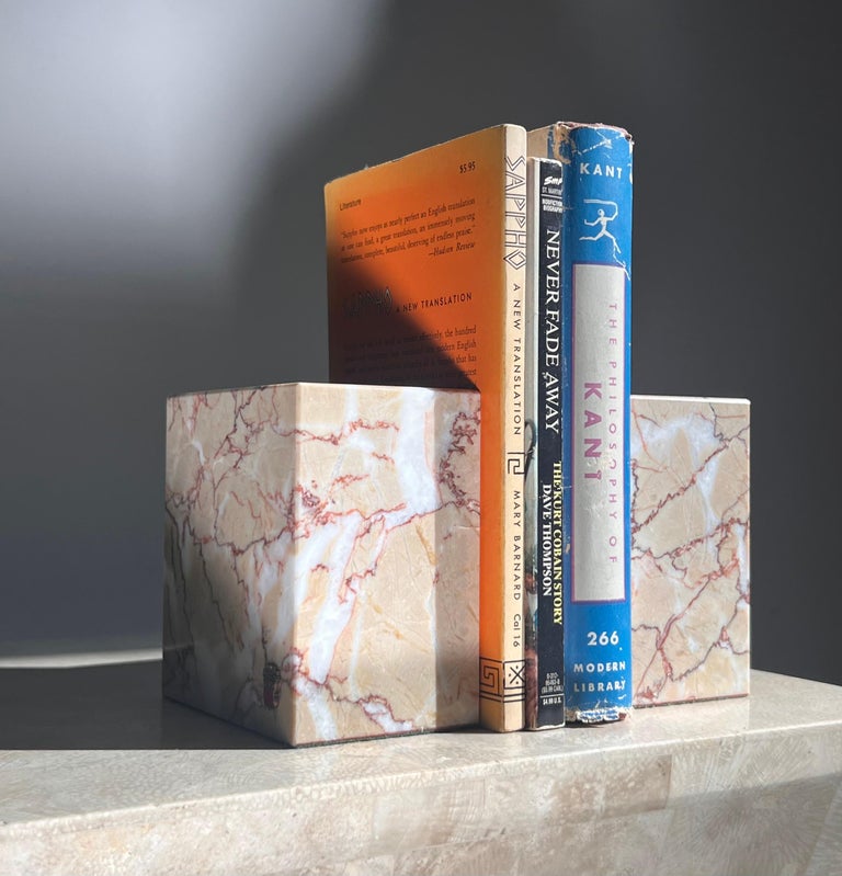A pair of pink marble bookends by Vermont Marble Co, mid 20th