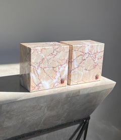 A pair of pink marble bookends by Vermont Marble Co, mid 20th century
