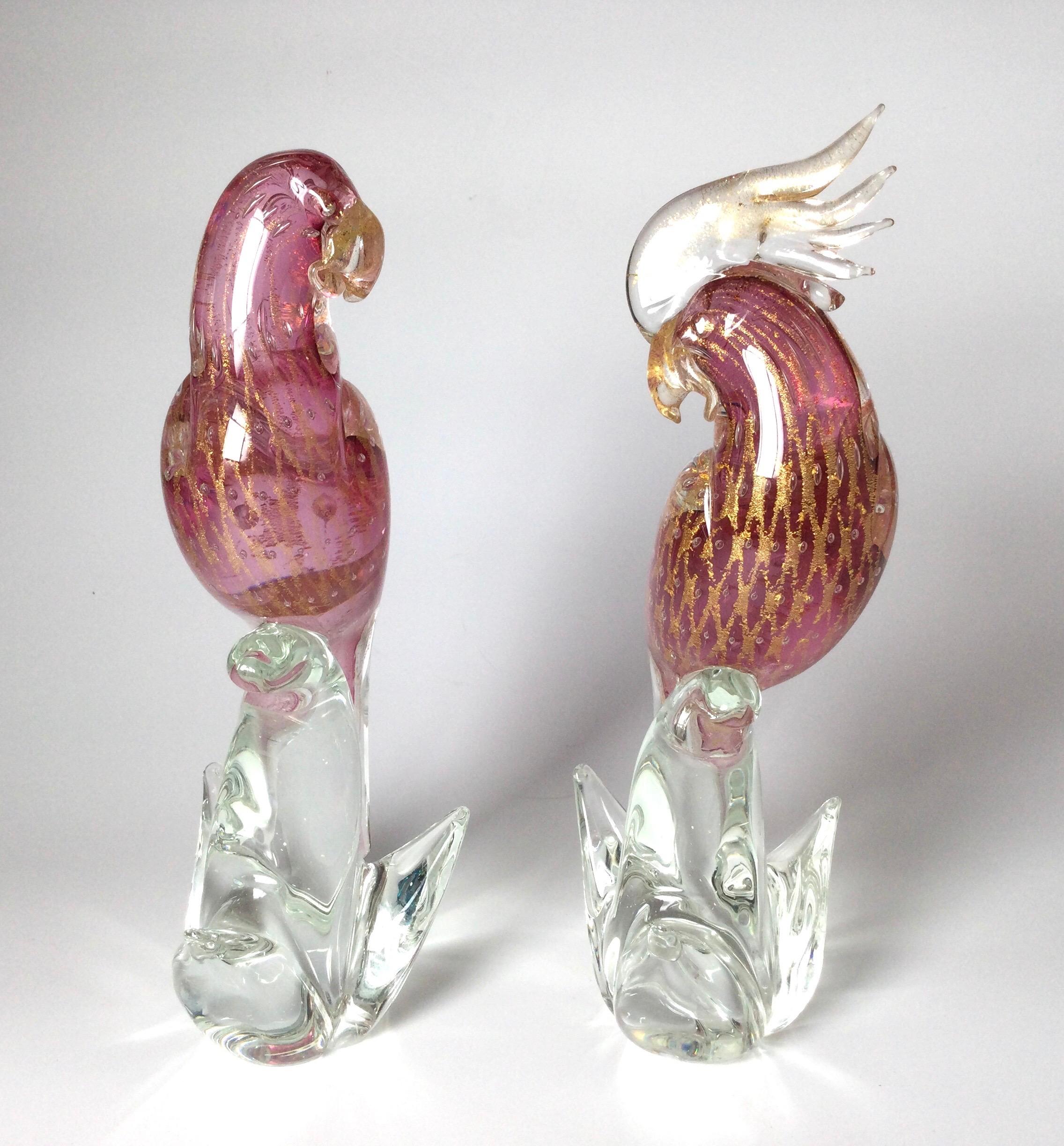 A pair of Murano Glass birds in pink and gold by artist S Sandro Frattin, circa 1970. 13.25 inches tall.