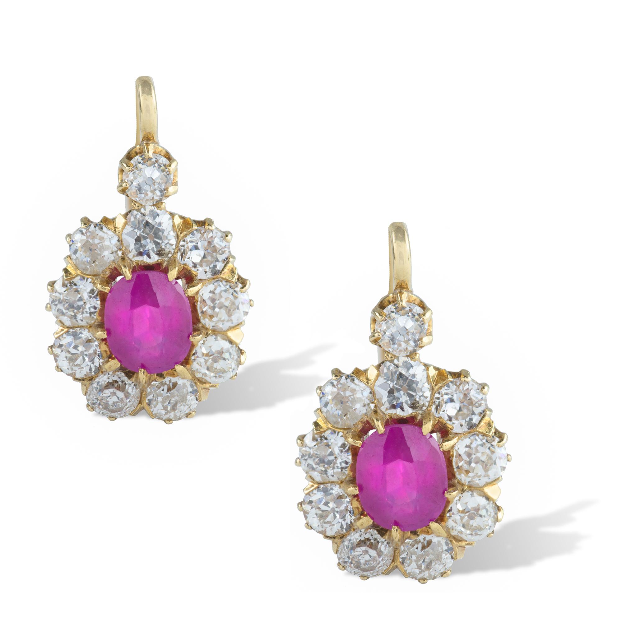 Oval Cut Pair of Pink Sapphire and Diamond Cluster Earrings