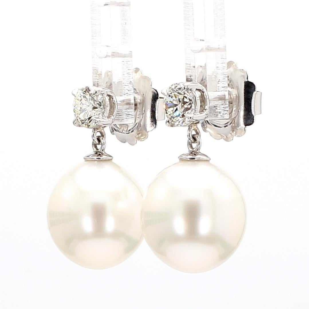 Round Cut A Pair of  Platinum/18KW White Gold Diamond and South Sea Pearl Drop Earring For Sale