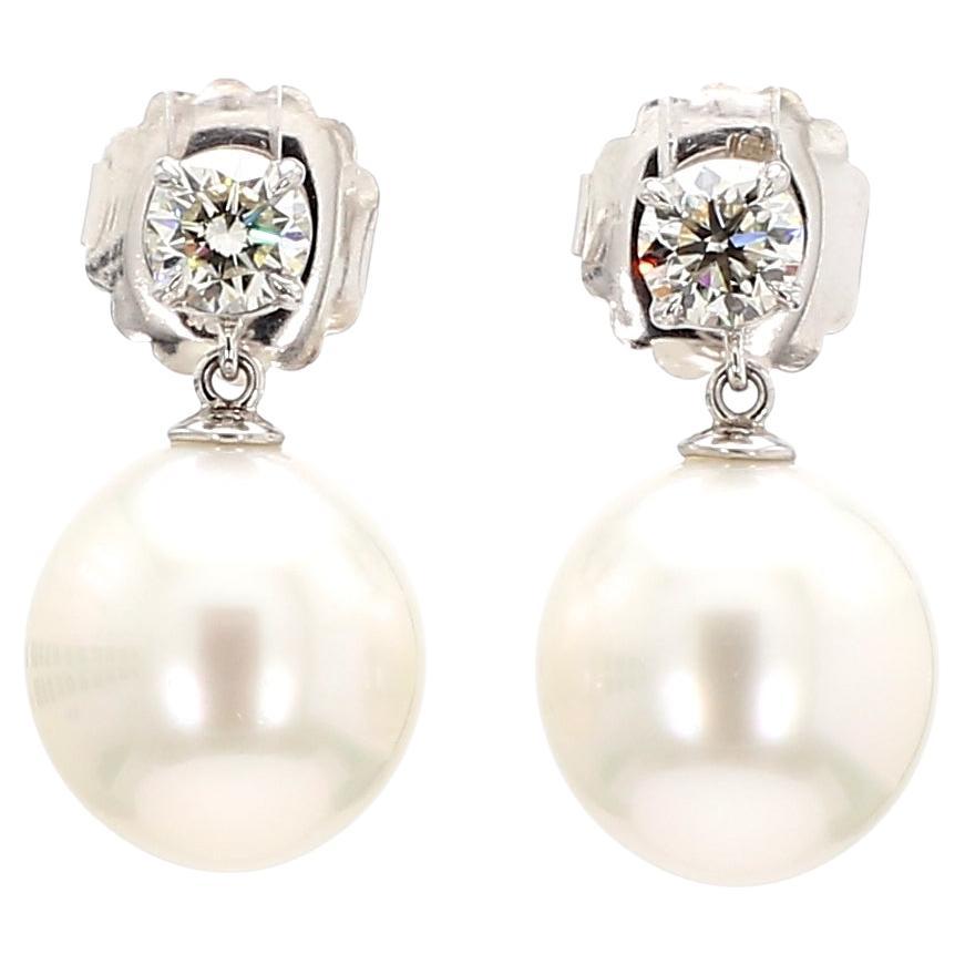 A Pair of  Platinum/18KW White Gold Diamond and South Sea Pearl Drop Earring