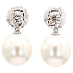 A Pair of  Platinum/18KW White Gold Diamond and South Sea Pearl Drop Earring