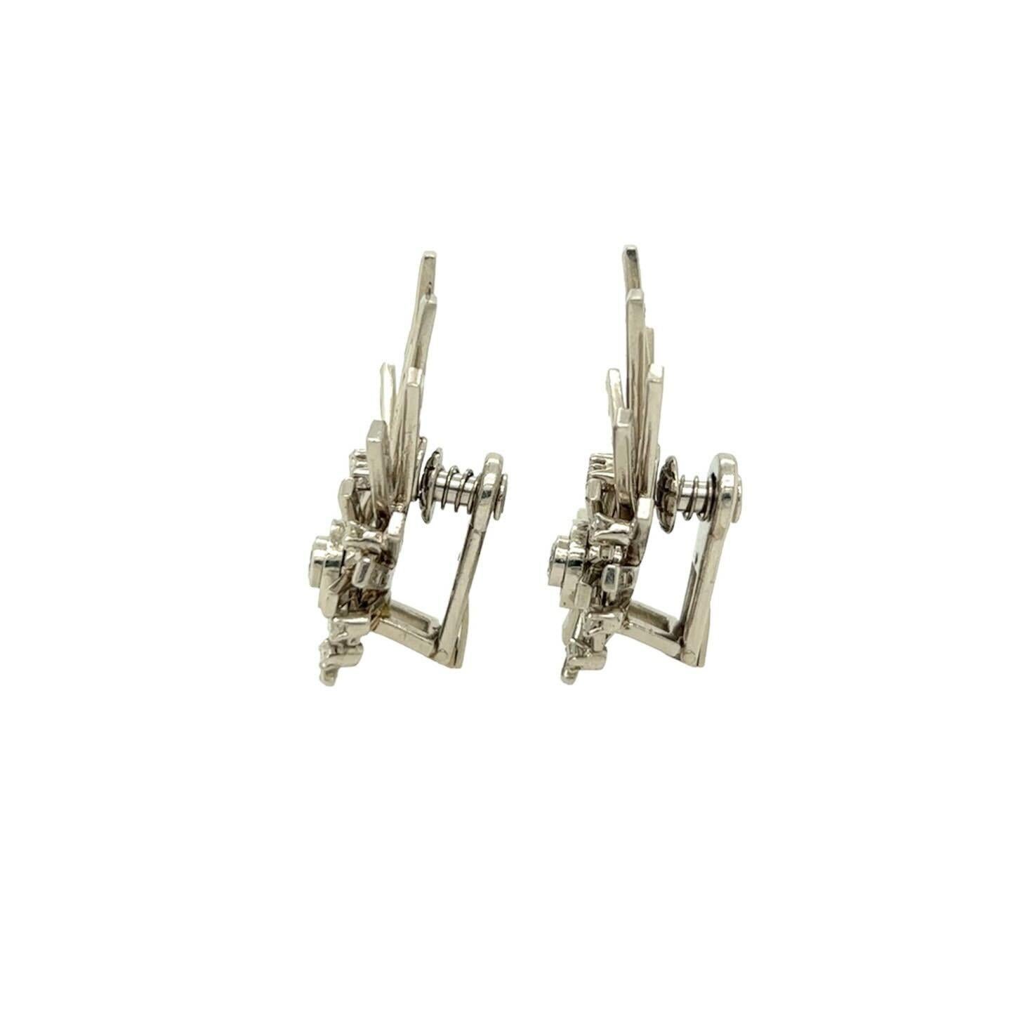 Baguette Cut A Pair of Platinum and Diamond Earrings