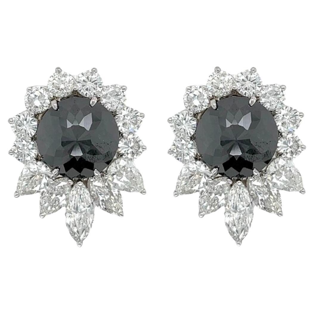 A Pair of Platinum, Black Diamond and Diamond Earrings For Sale