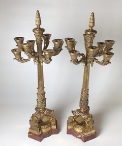 Pair of Polished Bronze and Marble Charles X Style Candelabra